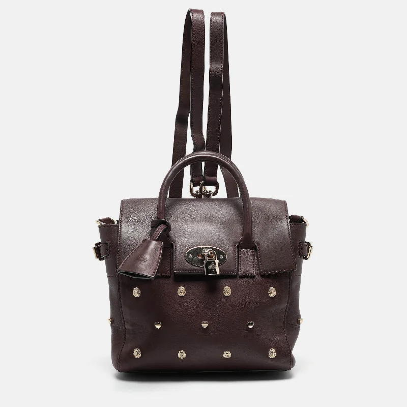 Handle bags with contrast stitching for detail -Mulberry Burgundy Leather Cara Delevigne Studded Convertible Backpack